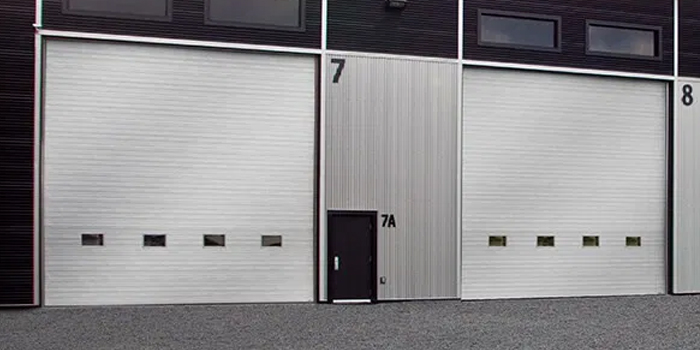 fix bent garage door in Bolton